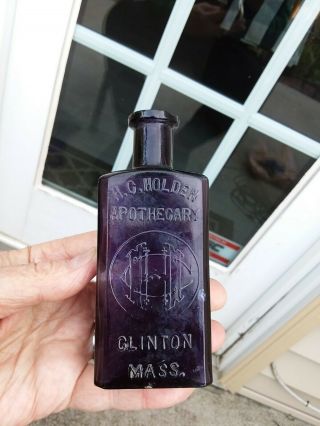 Deep Purple H.  C.  Holden Apothecary Clinton,  Massachusetts Blown Bottle Monogram