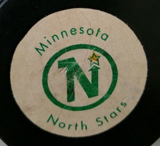 MINNESOTA NORTH STARS NHL RAWLINGS OFFICIAL SIZE HOCKEY PUCK RARE STAMPED CANADA 2