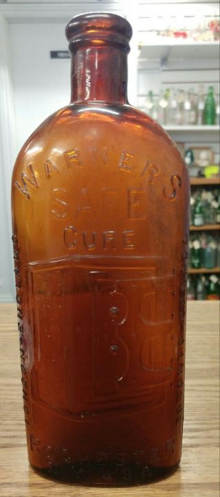 Antique Warners Safe Cure Three City Brown Medicine Bottle