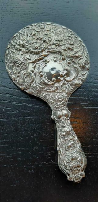 1909 English Silver Hand Mirror With Classic Embossed Cherub Design