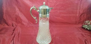 A Large Antique Silver Plated/cut Glass Wine Jug With Decorated Patterns.  Ornate.
