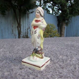 Antique English Staffordshire Pearlware Figure Of A Young Girl Circa 1810.