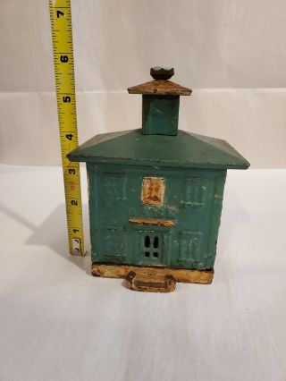Antique early cast iron still bank house 2