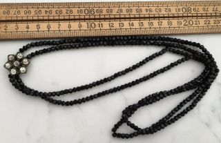 A Vintage Or Antique Black Glass Bead Necklace With Paste Stone Flower Pendant