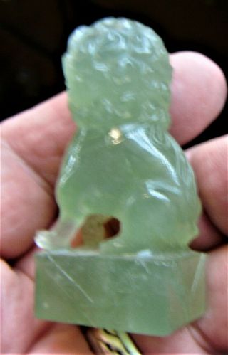 A Japanese/chinese Jade Carving Of A Shishi On An Oblong Base