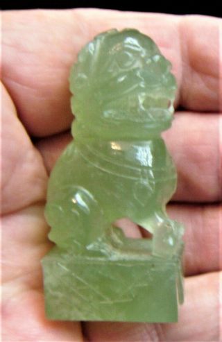 A Japanese/Chinese jade carving of a shishi on an oblong base 2