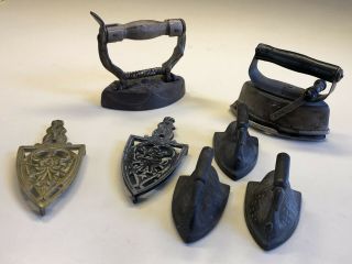 5 Vintage/antique Miniature Sad Irons Plus 2 Trivets All One Money
