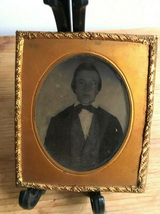 Antique Tintype Or Daguerreotype Of A Young Gentleman With Embossed Brass Frame
