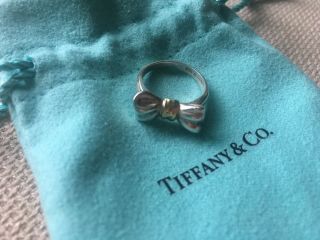 Rare.  Authentic Tiffany & Co Sterling Silver Ribbon Ring With 18k Gold.  Size 4.  5