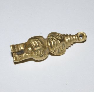 A Pre - Columbian Style Pendant.  Gold Colour.