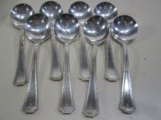 8 Pc.  " Plated With Pure Silver " Brand Silverplated Soup Spoons