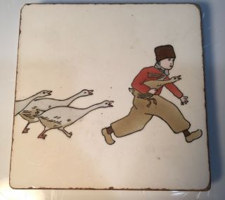 Antique G.  M.  T.  & Bro Germany Footed Ceramic Trivet Tile Boy With Geese Hotplate