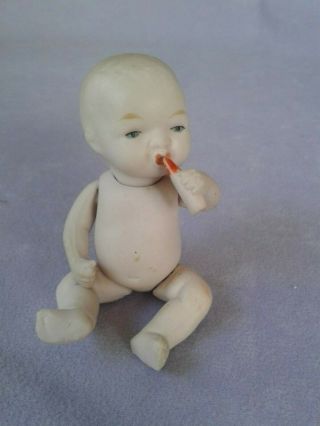 Antique German Bisque Miniature Baby Doll Holding Bottle 3 "