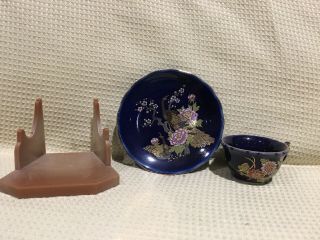 mini dark blue tea cup and saucer with peacock pink flowers with plastic stand 2