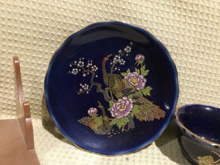 mini dark blue tea cup and saucer with peacock pink flowers with plastic stand 3