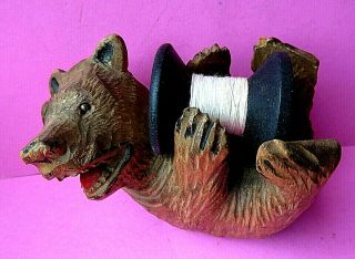 Antique Black Forest Carved Bear Sewing Spool Holder.
