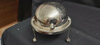 A Vintage Silver Plated Roll Top Butter Dish With Elegant Patterns.  Pawed Legs.
