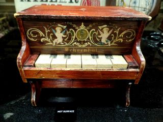Antique Toy Schoenhut Wood Piano With Cherub Design