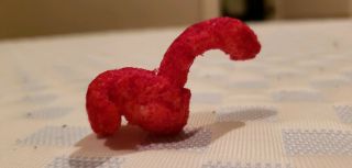 Flamin hot cheeto puff rare looks like long neck dinosaur 2