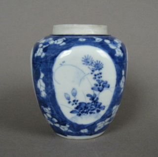 A Small Oriental Blue And White Porcelain Cracked Ice Jar
