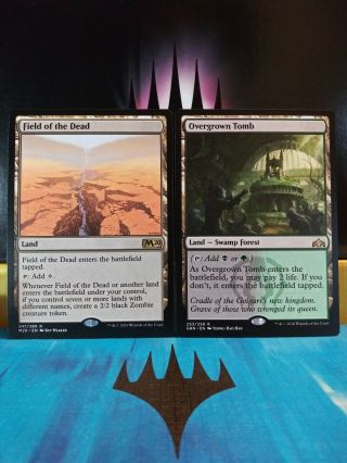 1x Field Of The Dead X1 Nm M20 & 1x Overgrown Tomb X1 Nm Grn Guilds Of Ravnica