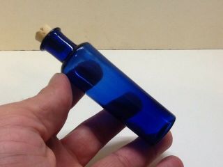 Small Antique Cobalt Blue 3 Piece Mold Cork Top Medicine Bottle.