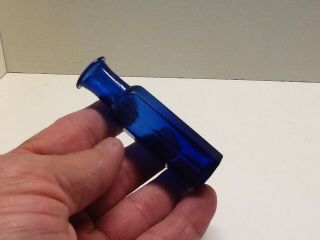 Small Antique Cobalt Blue 8 Sided Flared Lip Medicine Bottle.