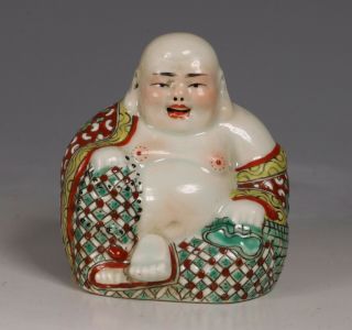 A Chinese Famille Rose Figure Of Budai