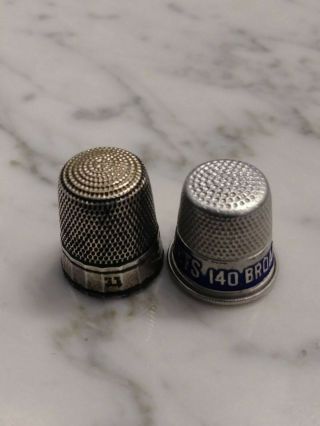 2 Antique Thimbles - one is Sterling Silver 2