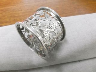 An Edwardian " N & H " Sterling Silver " Pierced " Napkin Ring Chester 1908