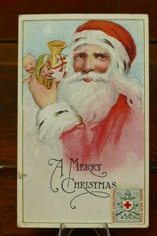 Antique 1917 Christmas Postcard - Santa Claus Holding Toys - Embossed - Posted