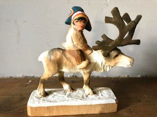 Vintage Norway Henning Hand Carved Wooden Boy Riding Reindeer Figurine
