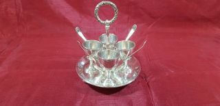 An Antique Victorian Silver Plated 4 Egg Cup Set By Walker And Hall.  Sheffield.