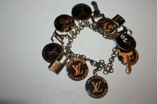 Rare Louis Vuitton Black And Silver Charm Bracelet,  Trunks & Bags One Size