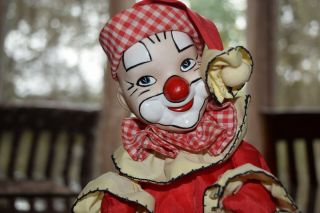 Vintage Porcelain Clown Rotating Wind Up Musical Doll Hand Painted Face Creepy