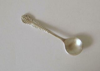 An Ornately Embossed Sterling Silver Small Salt Spoon Birmingham 1955 6.  2 Cms