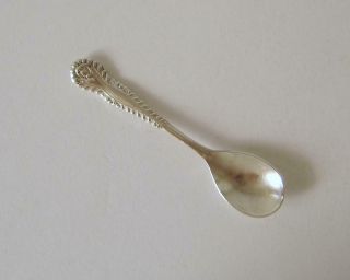 An Ornately Embossed Sterling Silver Small Mustard Spoon Birmingham 1955 6.  5 Cms