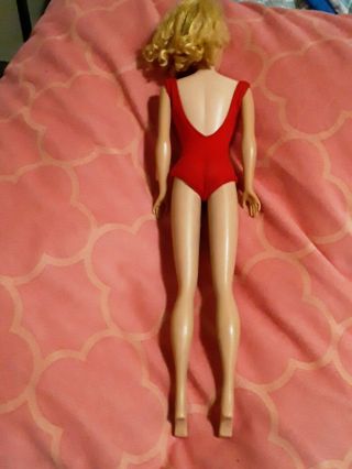 Vintage barbie dolls ponytail late 6 or 7.  red bathing suit. 2