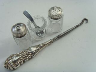 An Antique Sterling Silver And Glass Cruet Set & Silver Handled Button Lace Hook