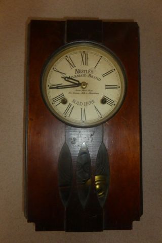 Antique Nestle Milkmaid Brand Wooden Wall Clock Rare
