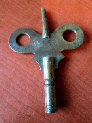 Antique Brass Waterbury Clock Co.  Trademark Winding Key (534f)