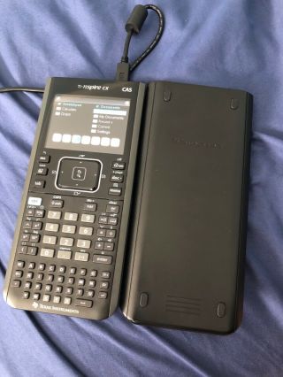 Texas Instruments TI - Nspire CX CAS Handheld Graphing Calculator.  Rarely 3