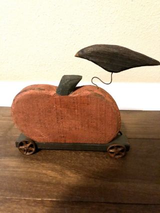 Primitive Halloween Decor Wood Rustic folk art fall Pumpkin With Crow On Wheels 2