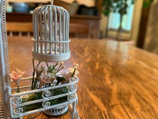 vintage white wicker plant stand and bird cage,  metal wickerwork,  flowers 3