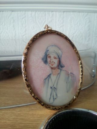 Portrait Miniature Of An Early 20thc Young Lady Behind Convex Glass,  Oval Frame.