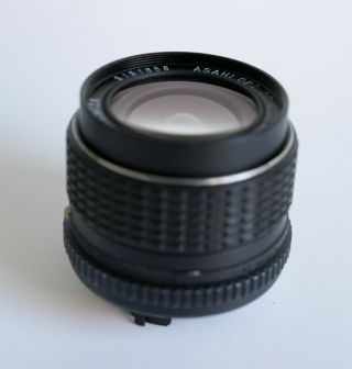 Pentax K - mount 28mm F3.  5 with voigtlander sony E adapter and rare hood 3